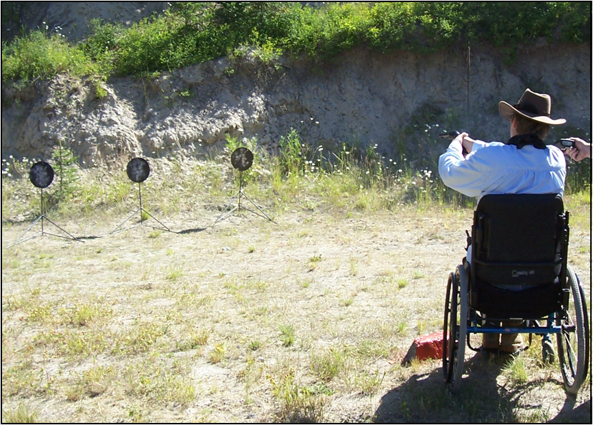 David Singleton shooting at 3 targets