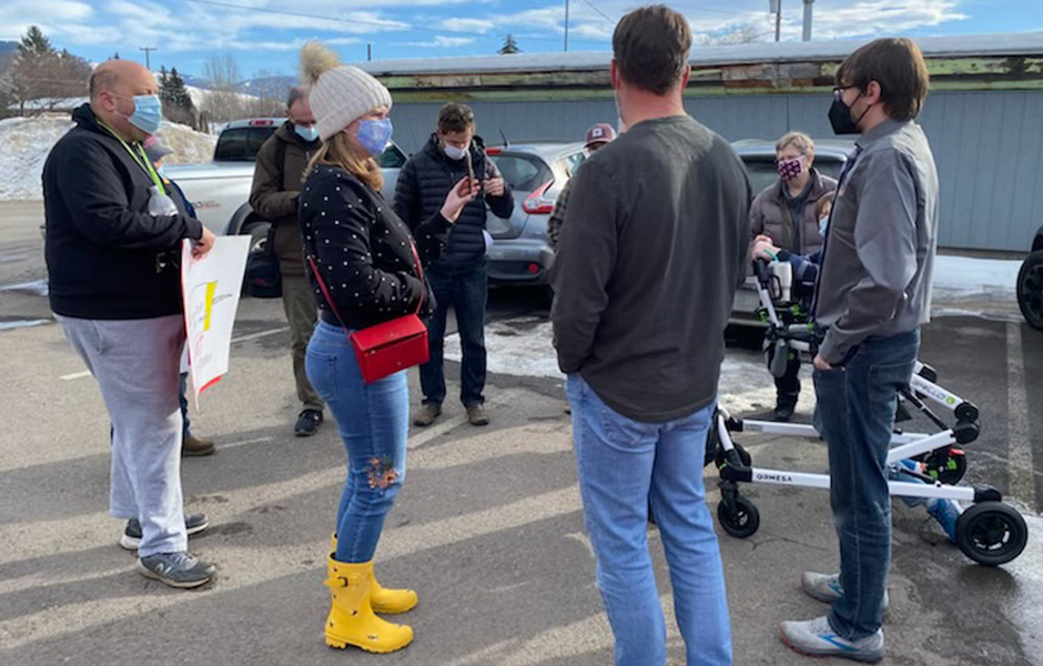 A group from Summit confront staff from Beehive Homes