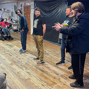 Four people participating in a workshop at BASE